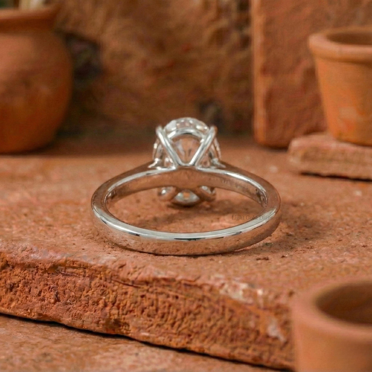 Oval Diamond Unique Engagement Ring in White Gold