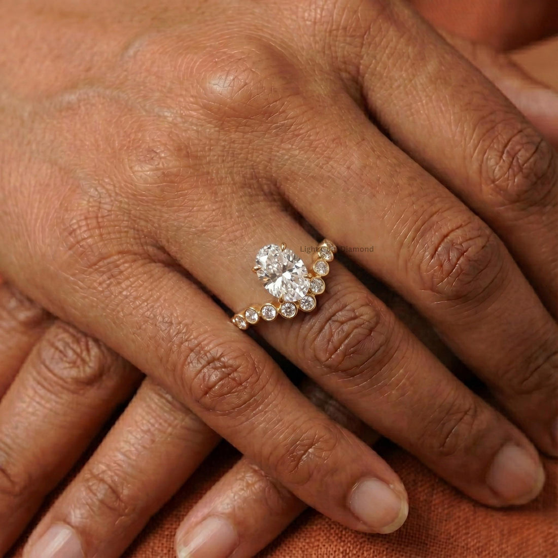 Oval cut bezel band ring Lab Grown Diamond Fingger pose