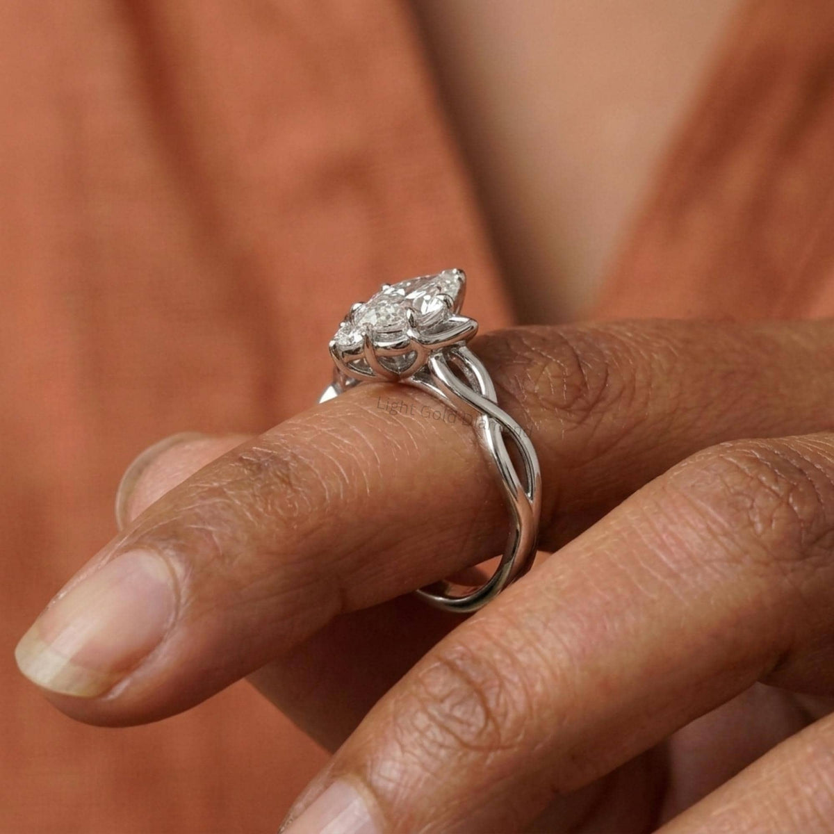 Pear Diamond Engagement Ring Finger Sitting